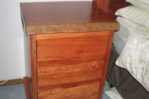 Bedroombedsidetablesmadeformredgumfeatureingaredgumslabtopwithnaturaledge.11