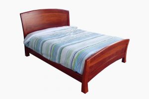 Bedroom setting made from redgum with curved legs and panels
